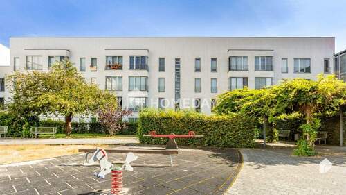 Außenansicht 3 - Zentral gelegen & dennoch ruhig: Helle Etagenwohnung mit praktischem Komfort & Tiefgaragenstellplatz