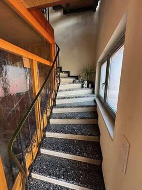 23a Treppenhaus zur WE im OG - 