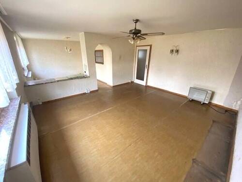 Wohnzimmer mit Blick zum Essbereich - Bungalow mit 89,00 m&sup2; in Hainspitz zum Kaufen