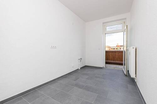 Küche mit Balkonzgang - Etagenwohnung mit 68,00 m&sup2; in Leipzig zum Kaufen