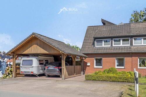 Carport - 9 Zimmer Mehrfamilienhaus, Wohnhaus zum Kaufen in Bocholt