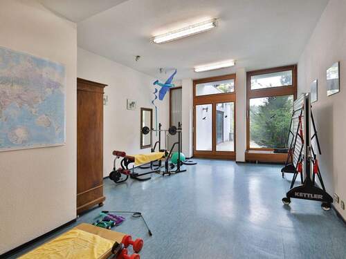 Eigener Fitnessraum mit großer Terrasse - 