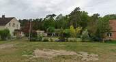 Blick von der Straße auf das Grundstück.jpg - Grundstück zum Kaufen in Neustadt-Glewe