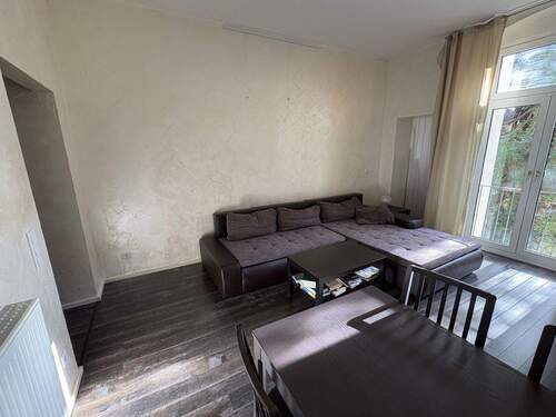 Wohnzimmer mit frz. Balkon - 