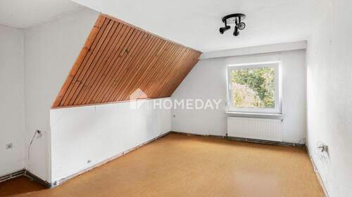 1. OG Schlafzimmer 1 - 