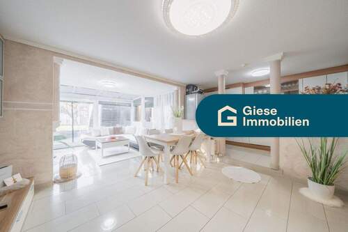 Titelbild - Moderne Wohnung mit Garten und Wintergarten