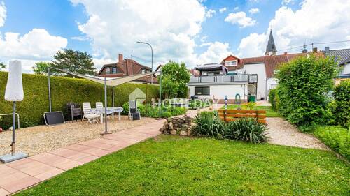 Garten 2 - Exklusives Wohnen: Ihr neues Zuhause mit beeindruckender Dachterrasse und Gartenparadies