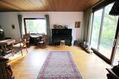 Wohnzimmer mit Zugang zum Garten - 