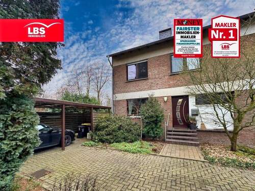 Hausansicht mit Carport - Familienidyll in Drevenack - REH mit Garage, Carport und Garten!