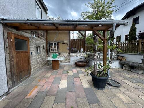 Eingang und überdachte Terrasse - 