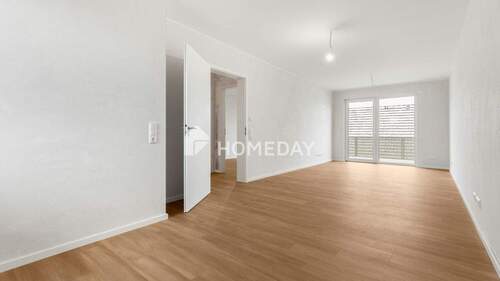 Wohnzimmer 1 - NeubauErstbezug! Zwei-Zimmer-Wohnung mit Balkon und Fußbodenheizung