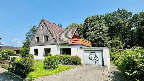 Vorderansicht - Gemütliches Einfamilienhaus mit malerischem Ausblick mit großem Grundstück 