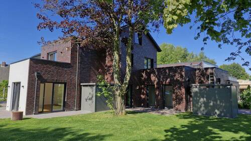 Blick vom Garten - Wohnen in ruhiger aber stadtnaher Lage bei geringsten Energiekosten und höchstem Wohnkomfort