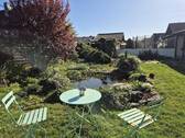 Garten mit kleinem Teich - Einfamilienhaus mit 177,00 m&sup2; in Hasselroth-Niedermittlau zum Kaufen