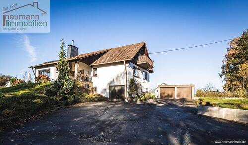 Vorderansicht - 9 Zimmer Einfamilienhaus zum Kaufen in Breitscheid