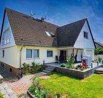 Außergewöhnliches Zweifamilienhaus im begehrten 