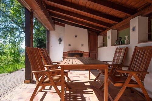 Überdachter Freisitz mit Kamin - 