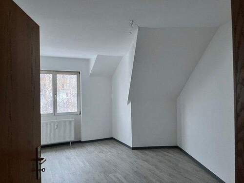 Ansicht Wohnzimmer mit Designvinylboden - 