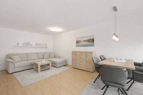 Das großzügige Wohnzimmer - Etagenwohnung mit 62,50 m&sup2; in Rostock zum Kaufen