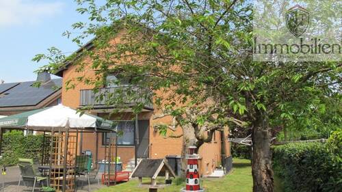 Haushinteransicht mit Garten - ETW mit schönem Garten und Doppelgarage in guter Lage von Lippstadt