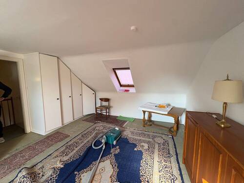 Zimmer im Dachgeschoss - 