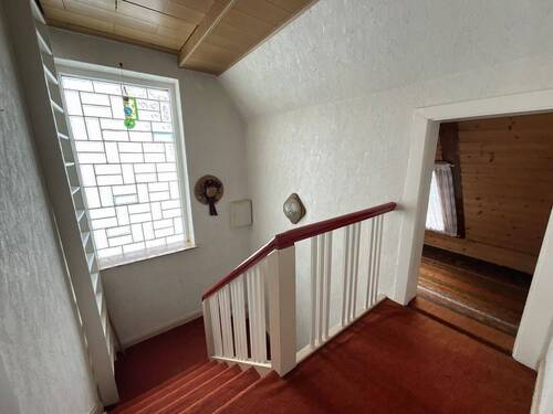 Treppenhaus mit Stauraum - 
