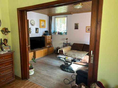 Wohnzimmer neben dem Essbereich - 