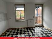Küche mit Ausgang zum Balkon - 