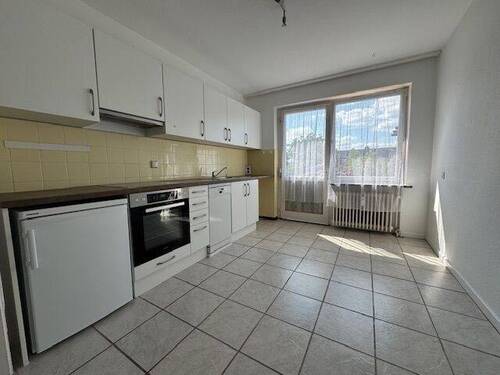 Küche mit Einbauküche - 