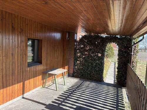 überdachte Terrasse - Einfamilienhaus mit 144,20 m&sup2; in Wagenfeld zum Kaufen