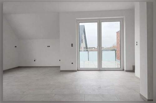 offene Küche und Wohnzimmer mit Zugang zum Balkon - 3 Zimmer Etagenwohnung zum Kaufen in Borken