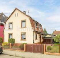 Familienfreundlich und charmant: Einfamilienhaus mit Wintergarten, Scheune und Garten in Neureut - Karlsruhe / Neureut
