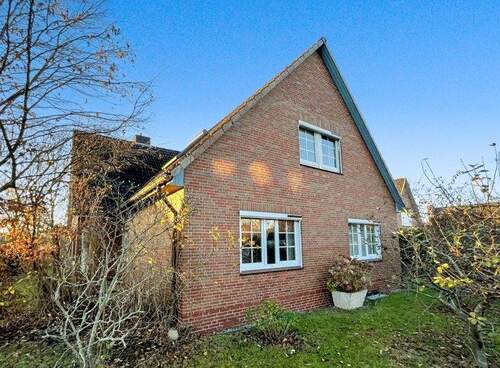 Vorderansicht - 8 Zimmer Einfamilienhaus zum Kaufen in Wacken