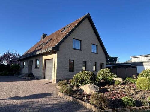 Straßenansicht - 8 Zimmer Mehrfamilienhaus, Wohnhaus zum Kaufen in Syke