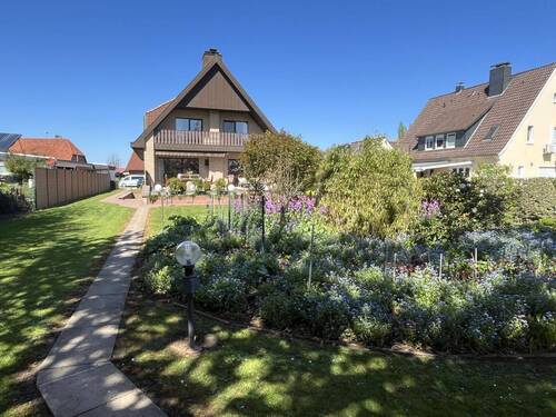 Gartenansicht - Mehrfamilienhaus, Wohnhaus mit 203,00 m&sup2; in Syke zum Kaufen