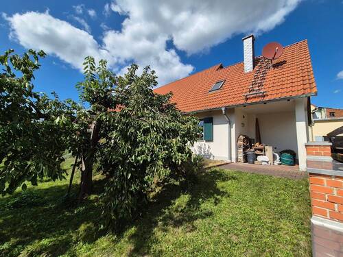 Haupthaus Rückseite / überdachte Terrasse - 