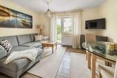 Wohnzimmer - Einrichtungsbeispiel - 2 Zimmer Terrassenwohnung zum Kaufen in Sankt Peter Ording