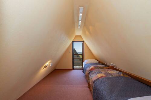 Der ruhige Schlafbereich im Obergeschoss - 