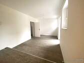 Blick ins Wohnzimmer - 2 Zimmer Etagenwohnung zur Miete in Westerheim