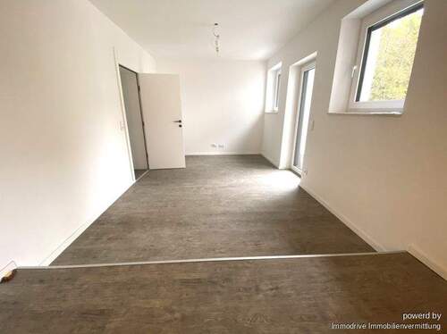 Blick ins Wohnzimmer - 2 Zimmer Etagenwohnung in Westerheim