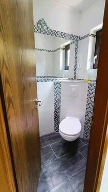 Gäste WC_EG - Einfamilienhaus mit 135,00 m&sup2; in Berlin zum Kaufen