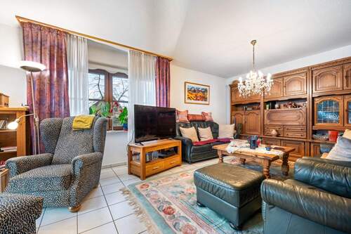 Wohnzimmer - Einfamilienhaus mit 146,80 m² in Tostedt zum Kaufen