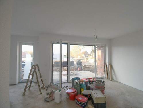 Wohnzimmer mit offener Küche - 2 Zimmer Etagenwohnung in Edewecht