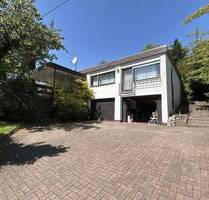 Sanierungsbedürftiger Bungalow aus Nachlass mit Wintergarten und 2 Garagen - aktuell vermietet - Neunkirchen/Wellesweiler