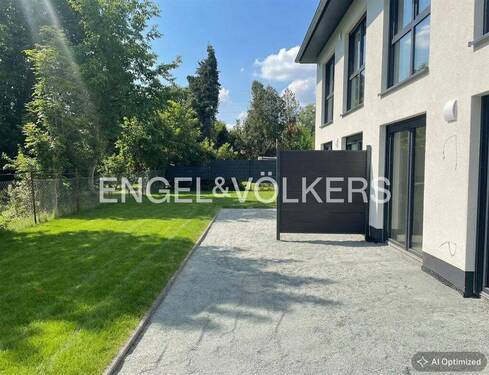 Terrassen- und Gartenbereich (KI-optimiert) - Moderne Neubau Doppelhaushälfte in familienfreundlicher Lage