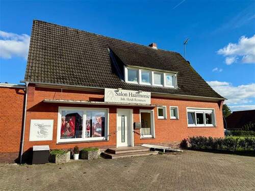 Straßenansicht - 8 Zimmer Einfamilienhaus zum Kaufen in Ihlow