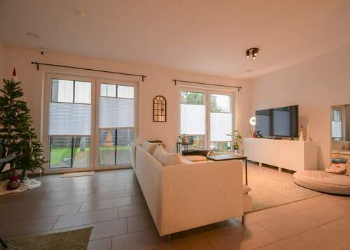 Wohnzimmer - Doppelhaushälfte mit 100,00 m² in Oldenburg zum Kaufen