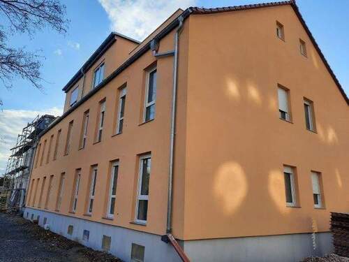 Hausansicht Balkonseite - Etagenwohnung mit 85,60 m&sup2; in Leipzig zur Miete