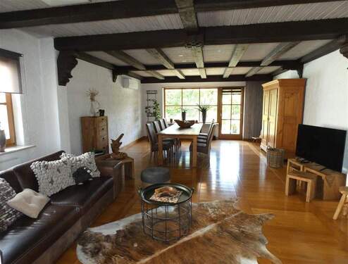 Wohn-,Esszimmer mit Zugang zur Terrasse - Bungalow mit 132,00 m² in Haßloch zum Kaufen