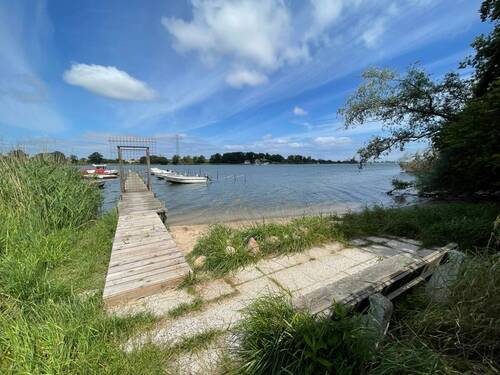 Bootsanleger über kleinen Seitenweg direkt vom Grundstück - Grundstück in Kappeln zum Kaufen
